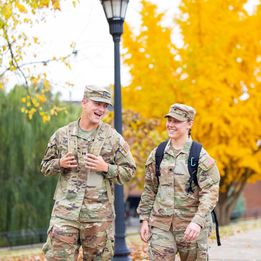 Students walking on campus of a fall day